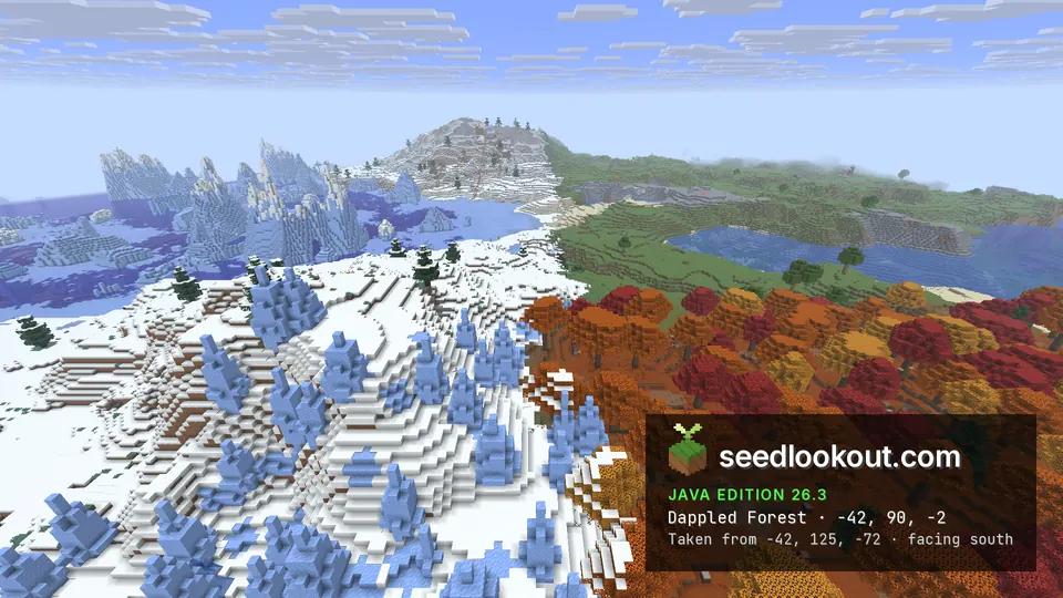 Blue ice spikes on snowy ground beside a band of red and orange trees, a lake and green plains behind