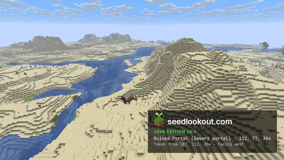 Small patch of netherrack and obsidian on sand beside a river, with a sand hill behind