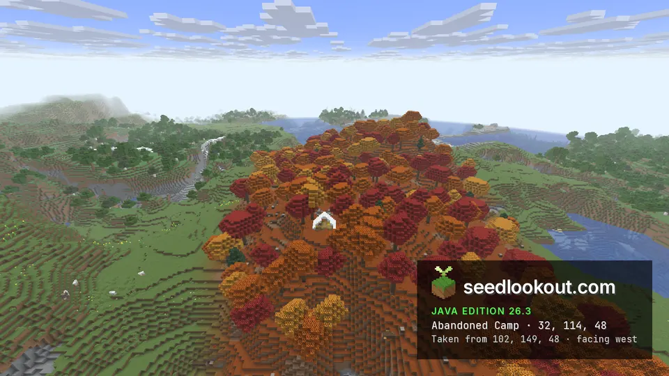 White tent among red, orange and yellow trees on a hilltop, green hills and a river beyond