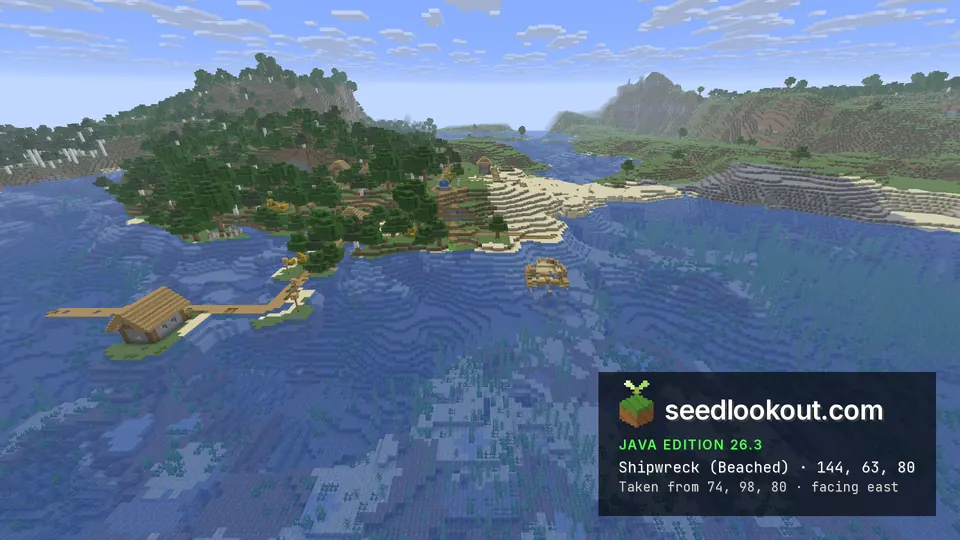 Village on a wooded point above a sandy beach, a pier house in the water and a small shipwreck in the shallows