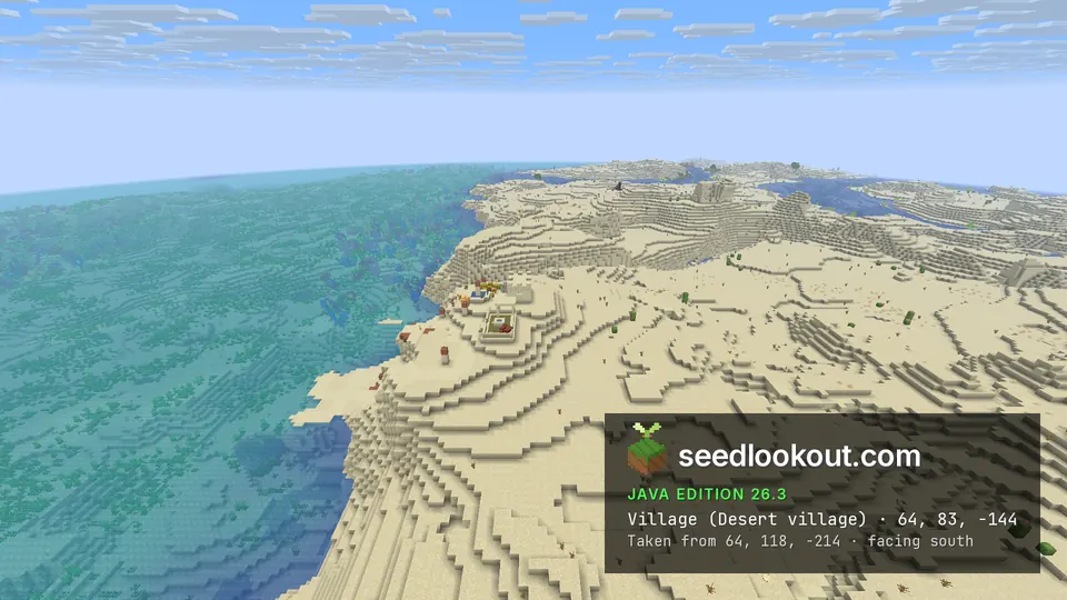 Desert village houses on sand dunes beside a shallow green sea, with more desert coast stretching south